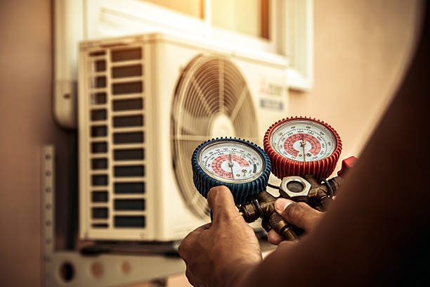 Professional Ductwork Repair technician working in Mound City, MO